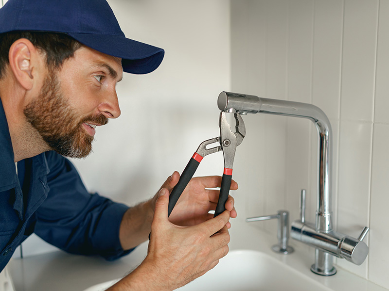 Airtech Mechanical plumber performing kitchen faucet & fixture repair in Livonia, MI