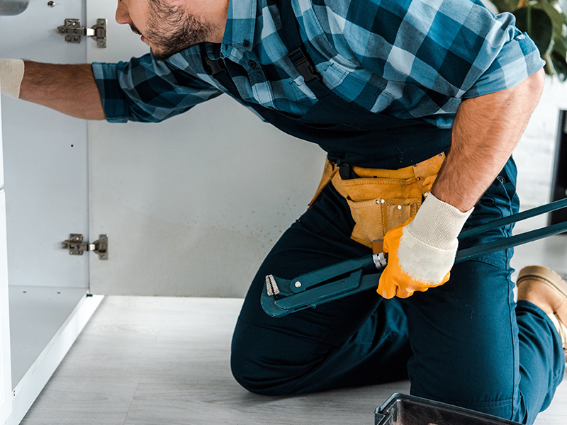 Airtech Mechanical technician performing professional plumbing repair in Livonia, MI